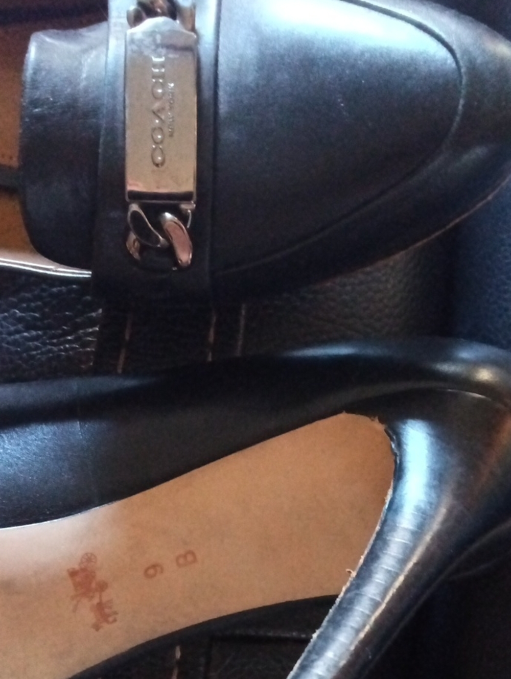 Coach Black Leather Heel Pumps with Metal Logo Plaque